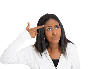annoyed middle aged woman with hand finger gun gesture