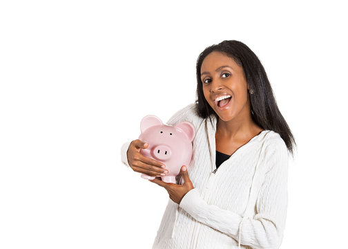 happy business woman, bank employee holding piggy bank