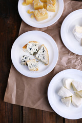 Fototapeta na wymiar Plates of various types of cheese