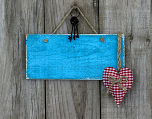 Blank blue sign with heart and iron keys