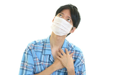 風邪に罹患した男性