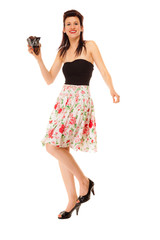 Teen girl with old camera