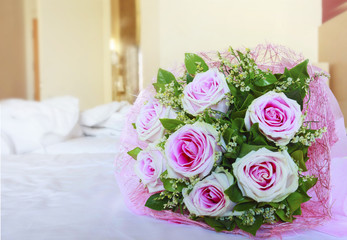 pink roses of valentine flowers bouquet on white bed with copy s