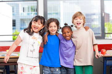 Multi ethnic classroom. Afro american, asian and caucasian prima
