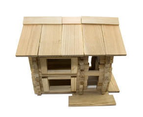 Isolated photo of wooden puzzle  toy cottage house, upper angle view.	
