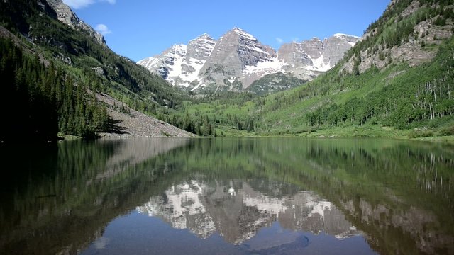 Maroon Bells with stream, Rocky Mountains, Colorado HD video