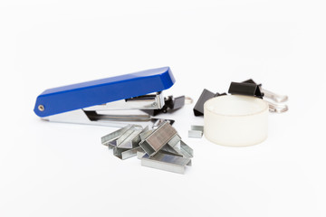stapler, staples and scotch on white background side view