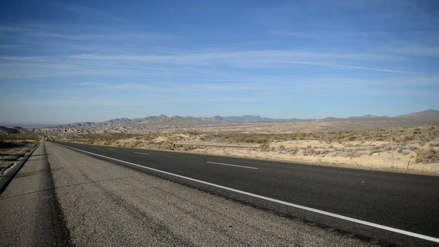 Remote stretch of road on Interstate in Desert and Mountains