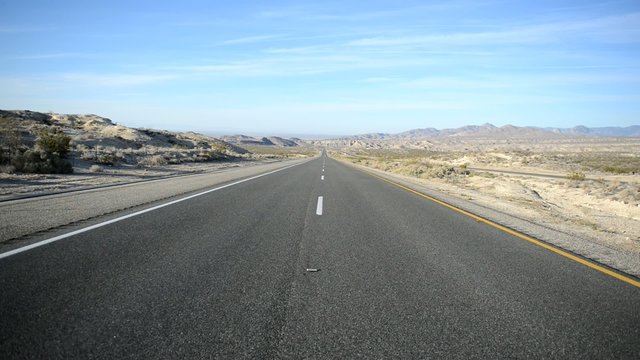 Remote stretch of road on Interstate in Desert and Mountains