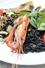 spicy squid ink spaghetti with green mussel and shrimp