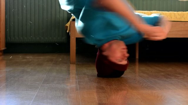 Young breakdancer in the room, close up
