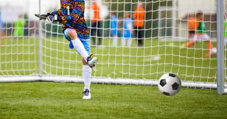 Football match for children. soccer tournament. goalkeeper save
