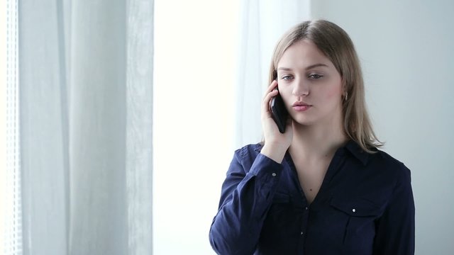 Girl talking on phone hangs up angry