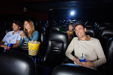 Fototapeta premium Happy People Watching Film