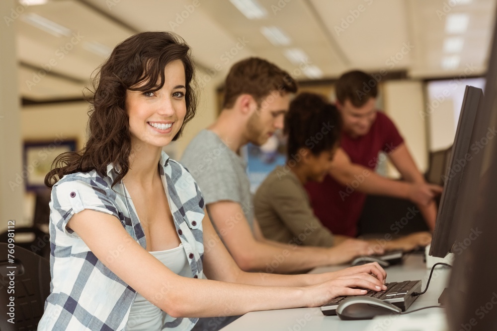 Wall mural classmates working in the computer room