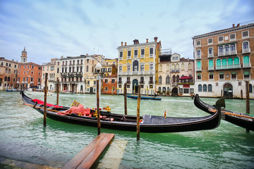 Fototapeta na wymiar Empty gondola in water canal