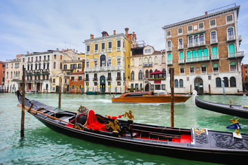 Fototapeta na wymiar Gondola in Venice water canal