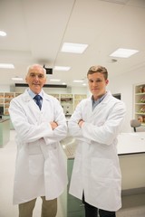 Fototapeta premium Science student and lecturer smiling at camera