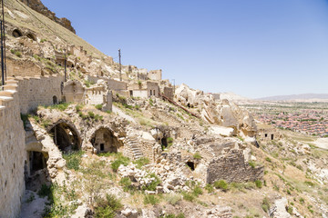 Fototapeta na wymiar Urgup. Ruins of facades 