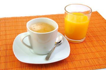 Cup of coffee and glass orange juice. Breakfast.