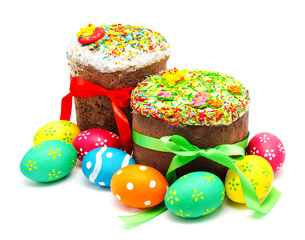 Two decorated easter cakes and eggs isolated