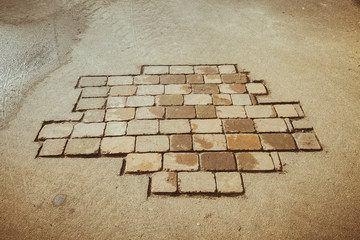 bricks in the pavement