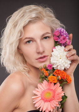 Blonde woman with flower