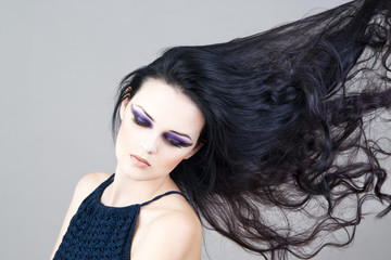 Fototapeta premium Professional makeup and hairstyle beautiful young woman close up
