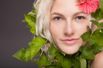 Blonde woman with flower