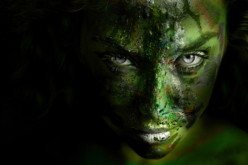 Young beauty woman stylish portrait. Green texture added