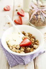 Homemade granola with saffron yogurt