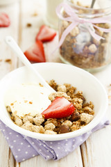 Homemade granola with saffron yogurt
