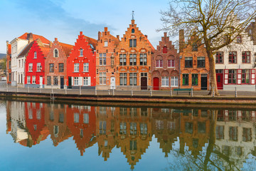 Scenic city view of Bruges canal with beautiful houses