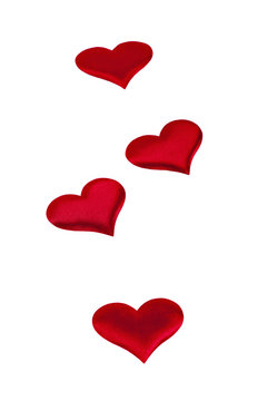 red hearts Valentine's Day symbols on a white background closeup