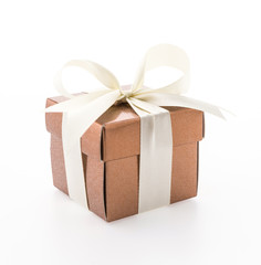 Gold gift box isolated on white background