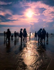 silhouette moment of tourists waiting for taxi boats