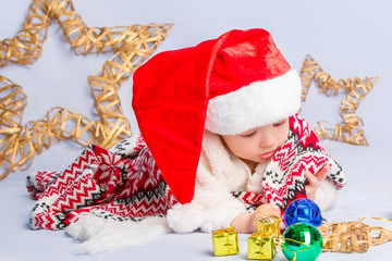 little baby celebrates Christmas