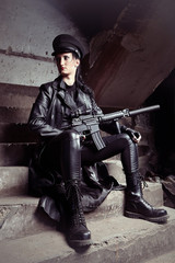 Naklejka premium Lady and automatic rifle