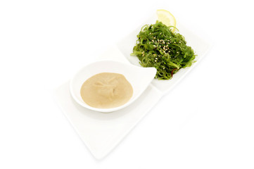 salad with exotic marine algae on a white background