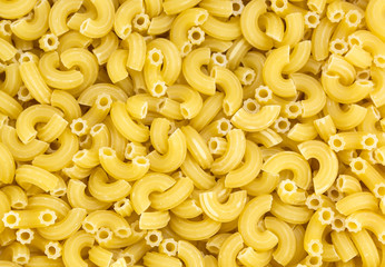background of raw pasta from durum wheat
