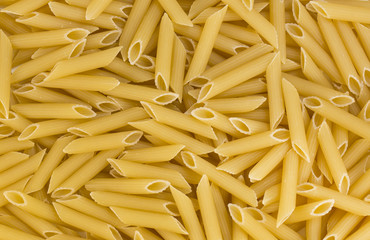 background of raw pasta from durum wheat