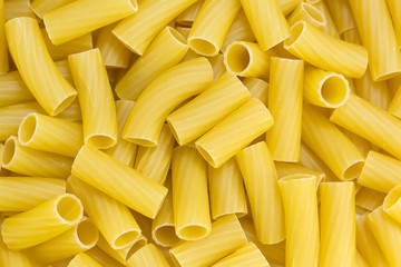 background of raw pasta from durum wheat