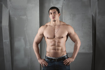 Fototapeta premium Close up of young muscular man