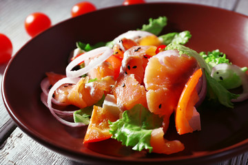 Fresh fish salad with vegetables