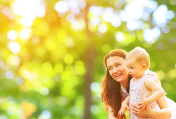 Happy mother and daughter laughing together