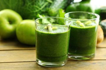 Green fresh healthy juice with fruits and vegetables