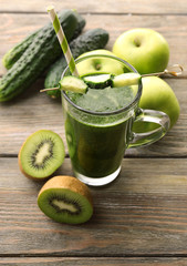 Green fresh healthy juice with fruits and vegetables