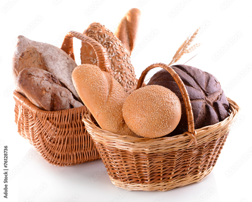 Canvas Prints different bread in wicker baskets isolated on white