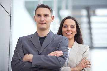 Portrait of two confident young businesspeople