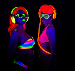 two sexy neon uv glow dancers